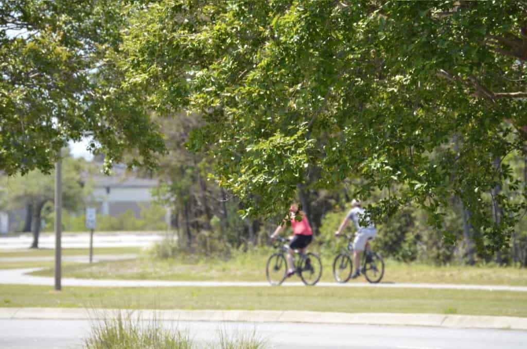 Safe from road traffic, the multi-use path is perfect for a family bike ride