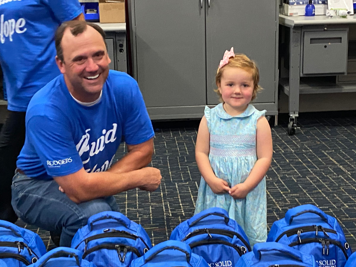 Roc Solid pack the bags event Arrowhead Environmental owner Michael Luter with Sadie