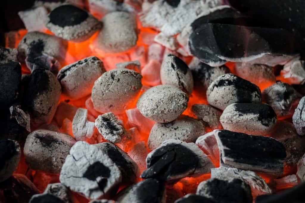 Don't start grilling until the charcoal is white or grey mostly