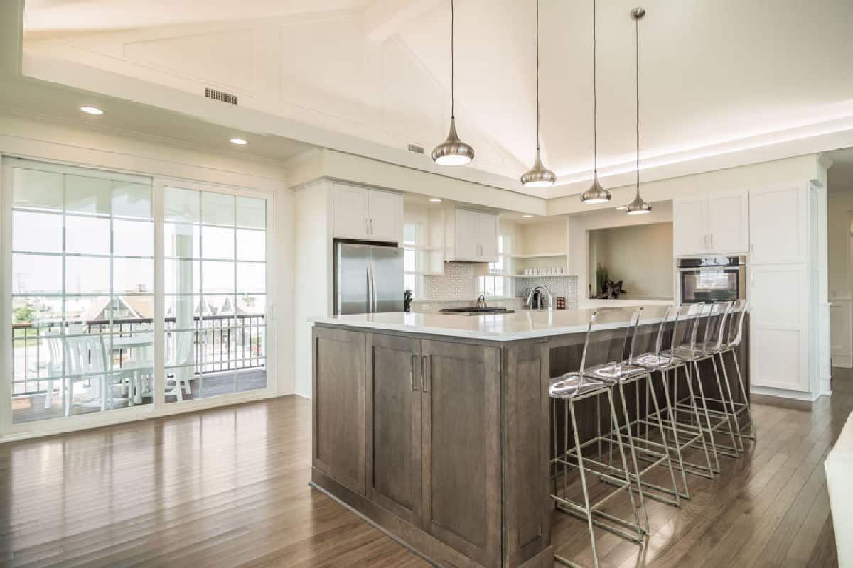 Easy flow and workspace in this open floor plan kitchen design on the Outer Banks built by SAGA Realty and Construction