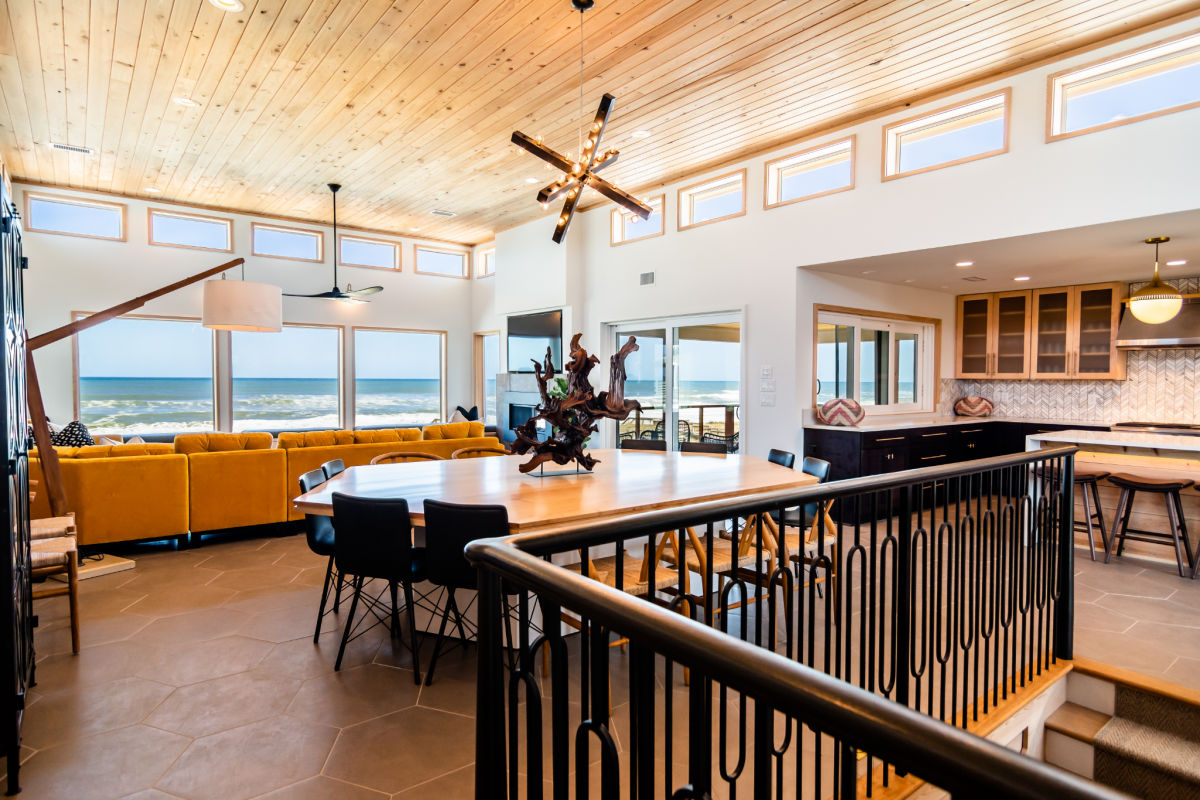 Light makes all the difference in an open floor plan on the Outer Banks by SAGA